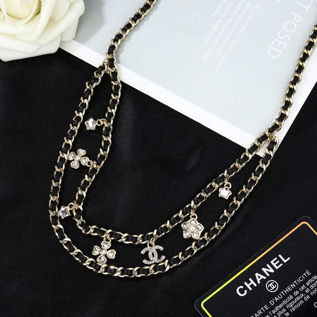 CHANEL 25S CHAIN BELT IN BLACK CALFSKIN AND GOLD METALLIC 614284