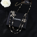 CHANEL 25S CHAIN BELT IN BLACK AND WHITE PEARL 614285